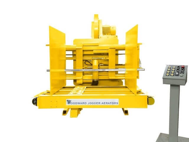 Yellow FL Series Jogger Aerator machine, expertly crafted by Woodward invented the Pile Turner and Jogger Aerator over 63 years ago, and has over 5,000.