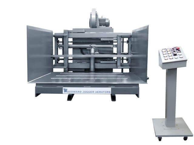 FLP Series dark gray Pile Turner and Jogger Aerator, innovative machinery by Woodward for over 63 years, with 5,000 units available.