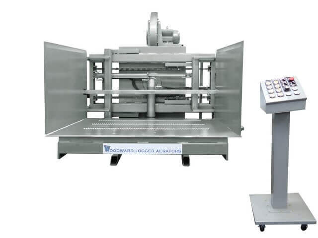 FLP Series gray Pile Turner and Jogger Aerator, innovative machine only available at Woodward, invented over 63 years ago with 5,000 installations.