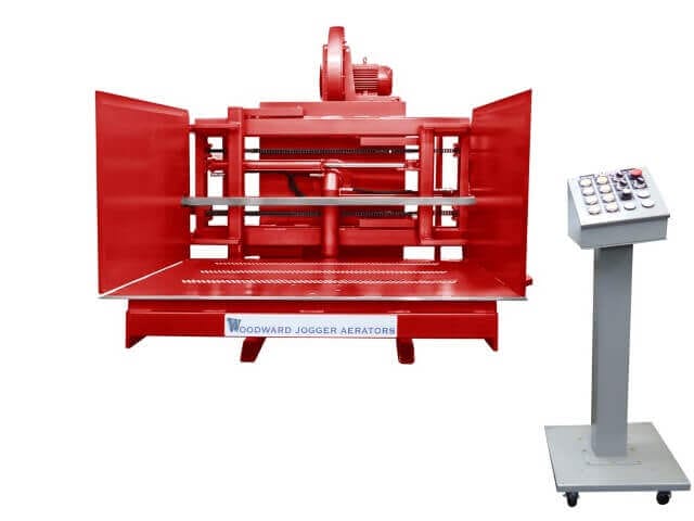 Red FLP Series machine with controls, only available at Woodward invented the Pile Turner and Jogger Aerator over 63 years ago, and has over 5,000.