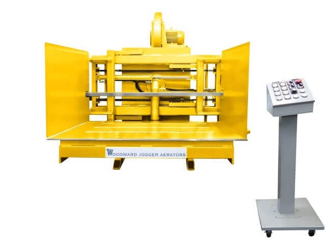 Yellow FLP Series machine, a Pile Turner and Jogger Aerator by Woodward invented the Pile Turner and Jogger Aerator over 63 years ago, and has over 5,000.